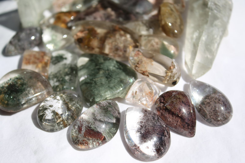 Our gorgeous collection of Chlorite in Quartz inclusion gems.